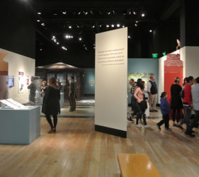 Visitors move through the exhibits
